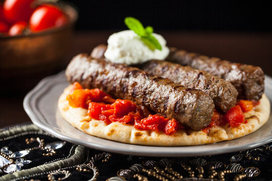 Greek kebab with tomatoes and pita