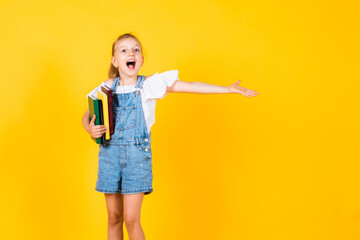 Look at this. childhood happiness. pretty teenage girl reading books. kid modern education. back to school. student study well. her favorite lesson. smiling child with notebooks