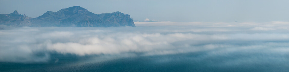Rock above the fog.