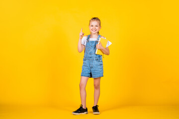 just get inspired. read the book. ready for reading. lesson of literature. happy childhood. back to school. development of smart kids. express interest and intelligence. small girl hold notebook