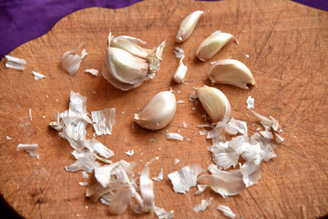 Garlic bulbs on a wood background