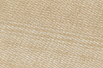 Fototapeta na wymiar Texture of coarse natural linen fabric of natural warm color. Light brown burlap.