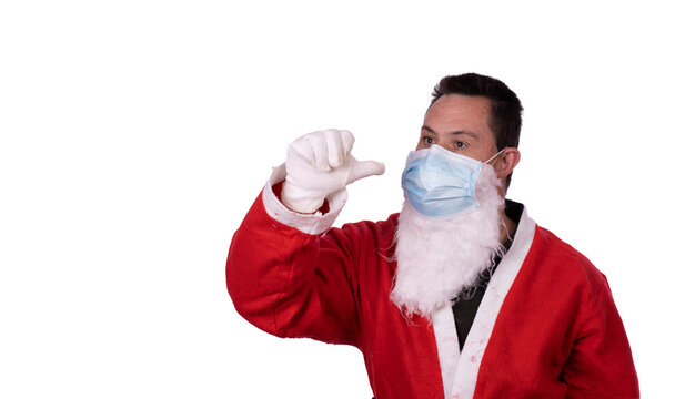 Man With Down Syndrome Dressed As Santa Claus With Protective Mask