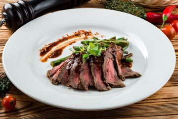 flank steak with chimichurri sauce. healthy food, style vintage. Skirt steak