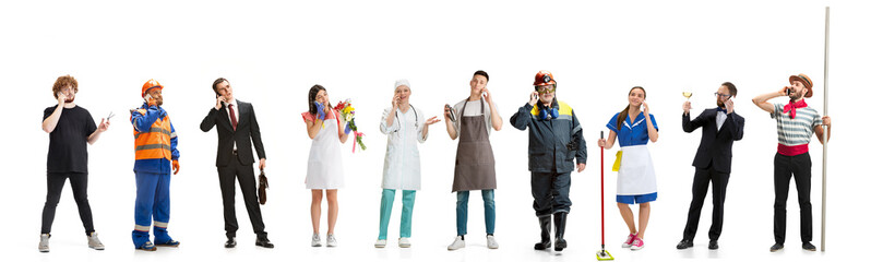 Group of people with different professions isolated on white studio background, horizontal. Male and female models like accountant, butcher, doctor, businessman, miner, barmen, housemaid, sailor