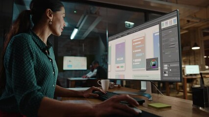 Middle Aged Multiethnic Specialist Working on Desktop Computer in Creative Office. Beautiful Diverse Multiethnic Female is Developing a New App Design and User Interface in Graphics Editing Software.