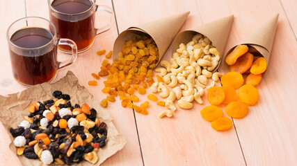 Morning coffee and a variety of dried fruits with nuts for Breakfast.