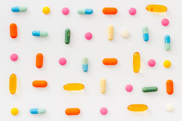 A lot of colorful medication pills drugs, top view