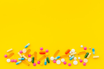 A lot of colorful medication pills drugs, top view