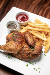 roast rotisserie half chicken with french fries simple meal