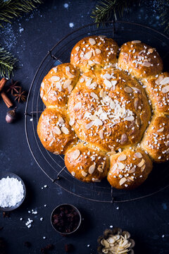 Swiss Three King's cake with sugar nibs and flaked almonds