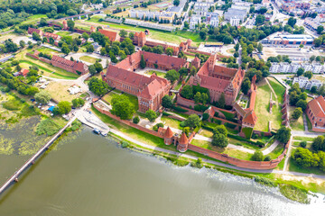 Fototapeta na wymiar Aerial view of Malbork Teutonic order castle in Poland. It is the largest castle in the world measured by land area and a UNESCO World Heritage Site, built in 13th-century.