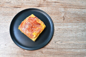 grilled toast topping ham pork and cheese on plate