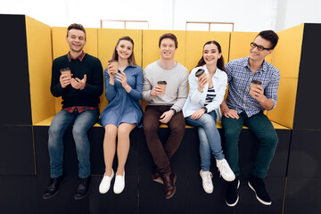Group of people are talking over cup of coffee.