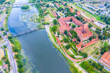 Aerial view of Malbork Teutonic order castle in Poland. It is the largest castle in the world measured by land area and a UNESCO World Heritage Site, built in 13th-century.