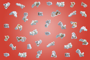Popcorn isolated on red background. Falling or flying popcorn. Close-up