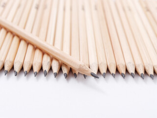 many simple pencils with a lead on a white background