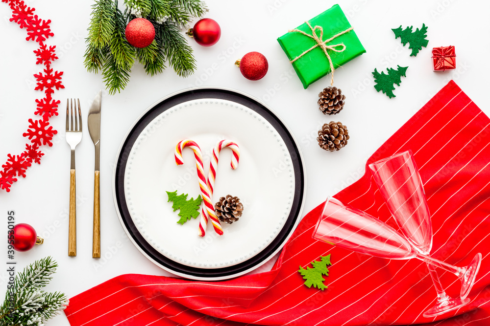 Wall mural top view of christmas table place setting with empty plate and festive decorations