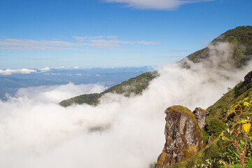 Beautiful scenic view of mountains and clouds against the sky in Kew Mae Pan nature trail at Doi Inthanon, Chiang Mai, Thailand. Famous tourist attractions of Thailand. Concept of holiday and travel