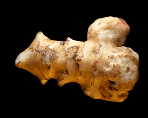 Ginger root isolated on black