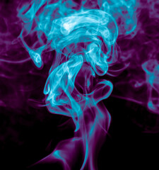 Fototapeta premium Purple and blue smoke isolated on black background. Abstraction