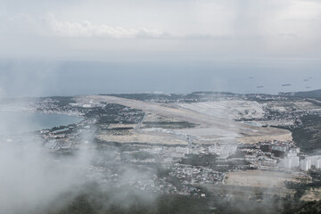 City life. Views of the city and suburbs. Over the mountains by car.