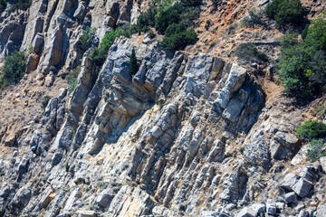 Stone rock in the mountains as an abstract background.