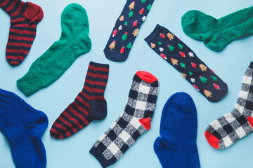 Warm socks on color background
