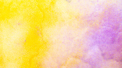 Yellow and purple paint on the snow in winter.