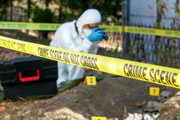Crime scene investigation. Forensic science specialist at work.