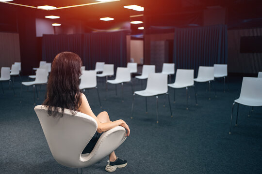 speaker waiting audience in empty conference hall for presentation or lecture