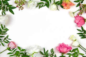 Obraz na płótnie Canvas Flower arrangement. Pink and white flowers on a white background. Valentine's day. Flat lay, top view, copy space.
