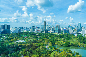 Fototapeta premium Beautiful landscape of cityscape with city building around lumpini park in bangkok