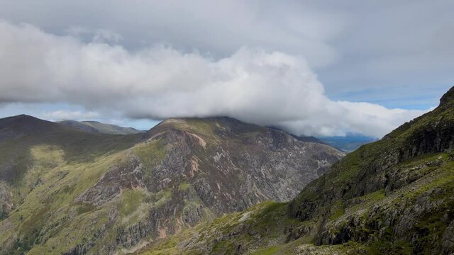 Thick Clouds Covering Majestic Peaks Of Beautiful Mount Snowdon Snowdonia Wales