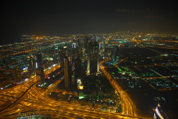 Naklejka na ściany i meble Dubai Stadt Luftfoto innenstadt Strasse Gebäude Nacht Lichter Hochhaus Verkehr