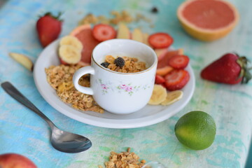 Yogurt with seasonal fruits and granola.