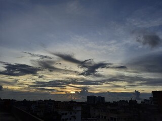 time clouds over city