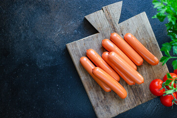 meat sausages pork, beef or chicken ready to eat on the table healthy meal snack ingredient top view copy space for text food background rustic
