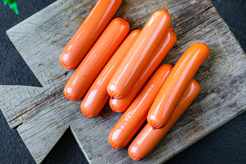 meat sausages pork, beef or chicken ready to eat on the table healthy meal snack ingredient top view copy space for text food background rustic