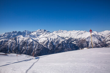 Winter landscape - Panorama of the ski resort with ski slopes. Alps. Austria.