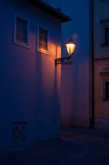 Nocna uliczka z latarnią. A night street with a lantern. © photogam