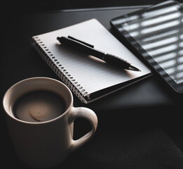 Afternoon work coffee break with notebook and tablet 
