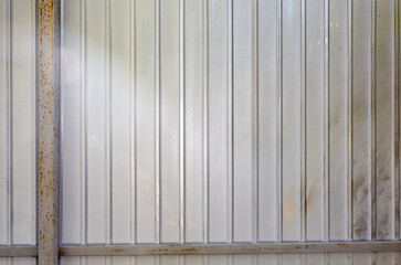 White corrugated metal or zinc texture surface or galvanize steel in the vertical line background. Close-up of zinc wall background