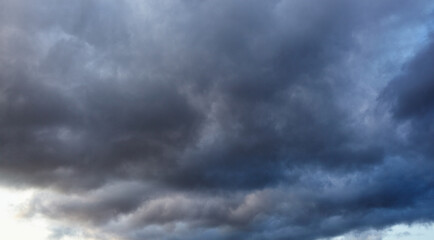 Dramatic black cloud before rainy.  Beautiful cloudscape over horizon, sky.