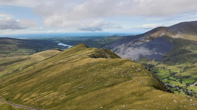 Beautiful Rolling Hills Of Snowdonia Countryside Below Mount Snowdon Wales