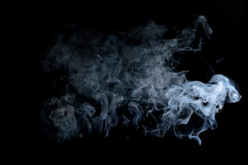 White fog or smoke image Smoke from fire on a black background is ideal for a beautiful effect.