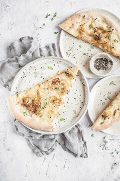 Pizza bianca with onion and cheese