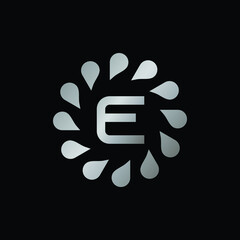 Logo Design for Letter E. Silver Letter E logo design isolated on black background.Silver Vector jewelry concept.