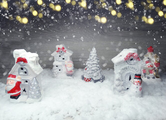 winter background with snowman decor and snow