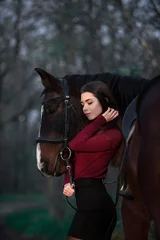 Foto op Canvas beautiful girl with the brown horse in the autumn forest © Виктория Литовская